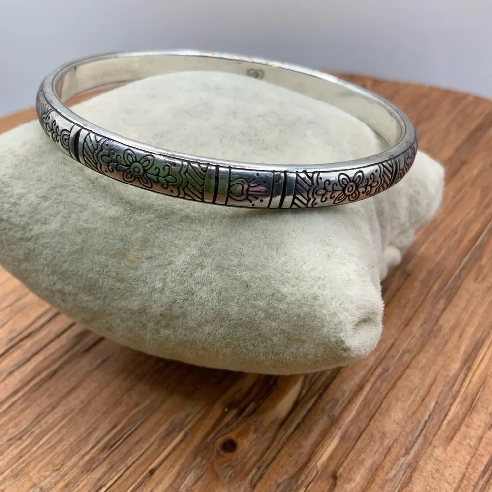 Brighton Silver-Tone Floral and Love Pattern Engraved Bangle Bracelet